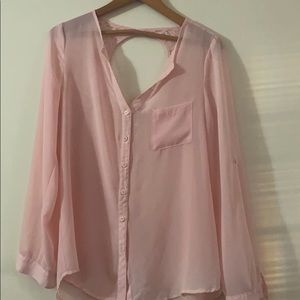 Pink flirty office or date night button up shirt.